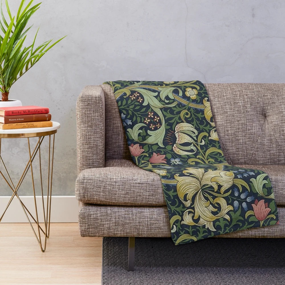 Plush blanket featuring the iconic golden lily floral pattern designed by British artist William Morris