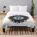 Plush designer blanket with vibrant, symmetrical patterns