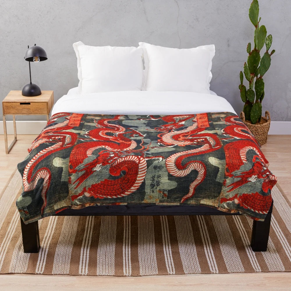 Plush blanket featuring a vibrant Japanese woodcut style illustration of a red and black dragon
