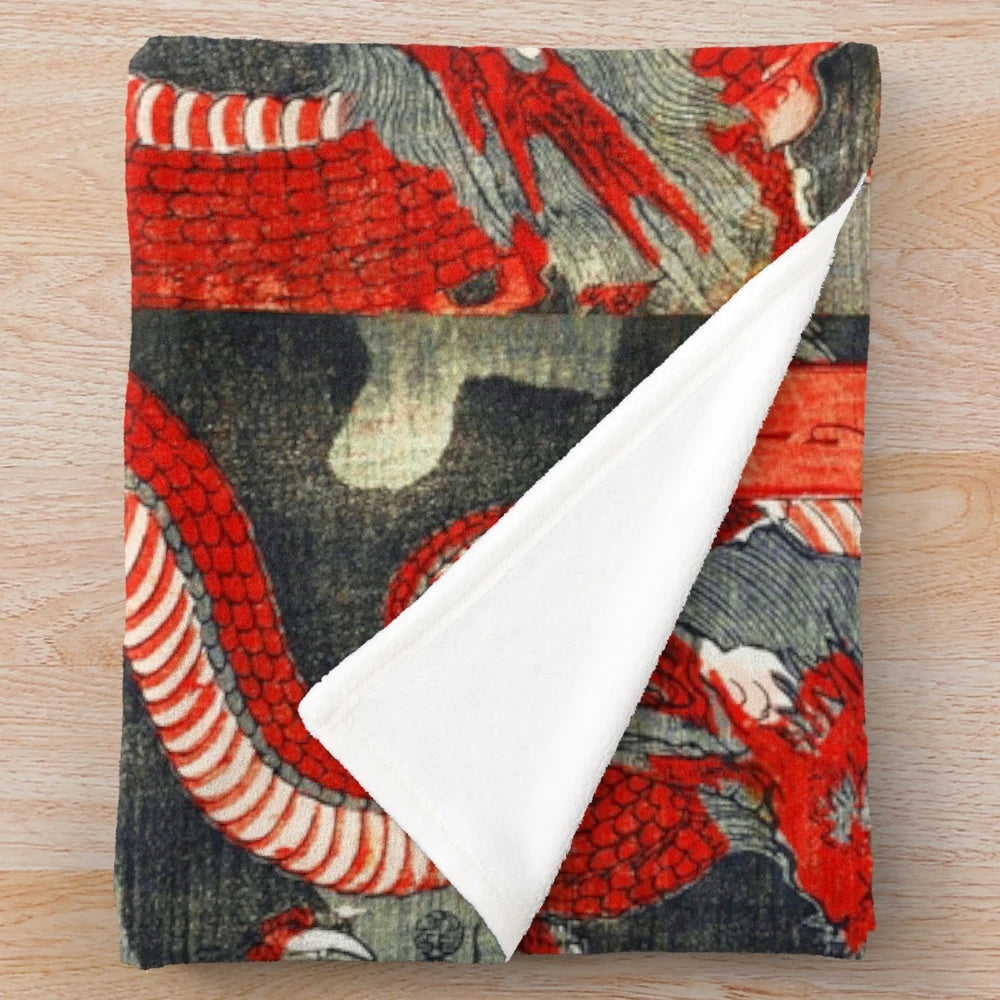 Plush blanket featuring a vibrant Japanese woodcut style illustration of a red and black dragon