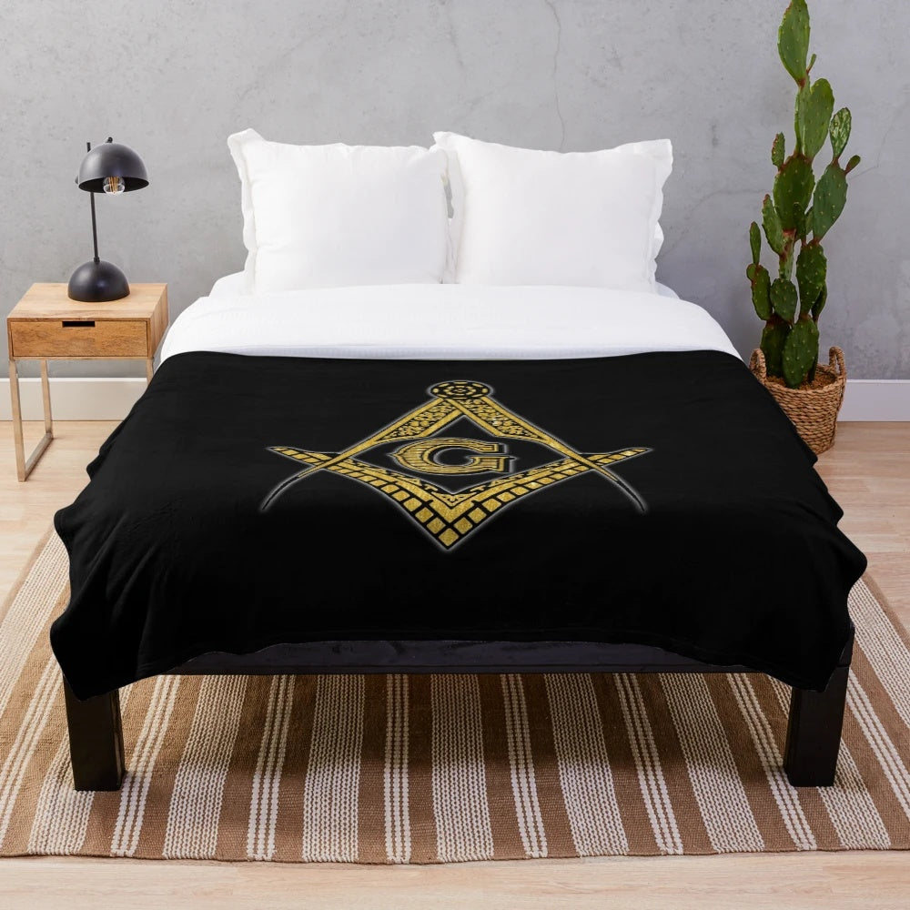 Soft and cozy plush blanket featuring Freemason symbols in black and gold