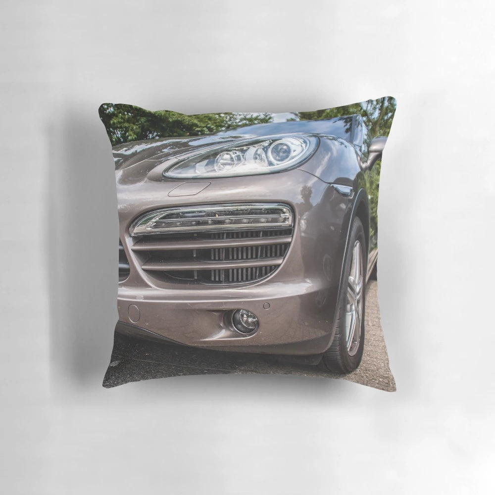 A plush, comfortable pillow featuring the iconic Porsche Cayenne SUV design.
