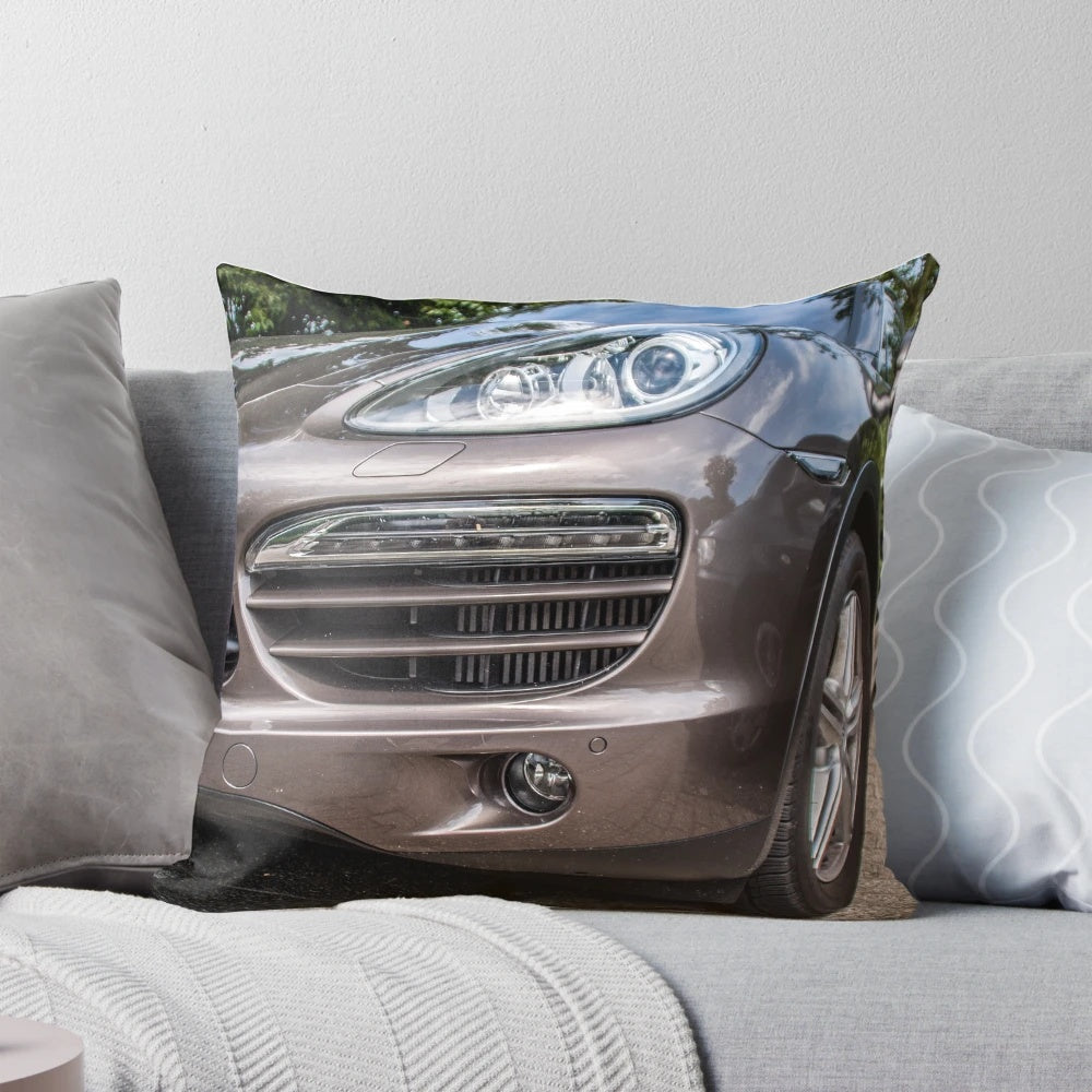 A plush, comfortable pillow featuring the iconic Porsche Cayenne SUV design.