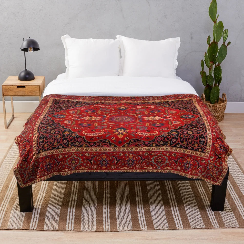 Red Persian-inspired plush blanket with antique rug design