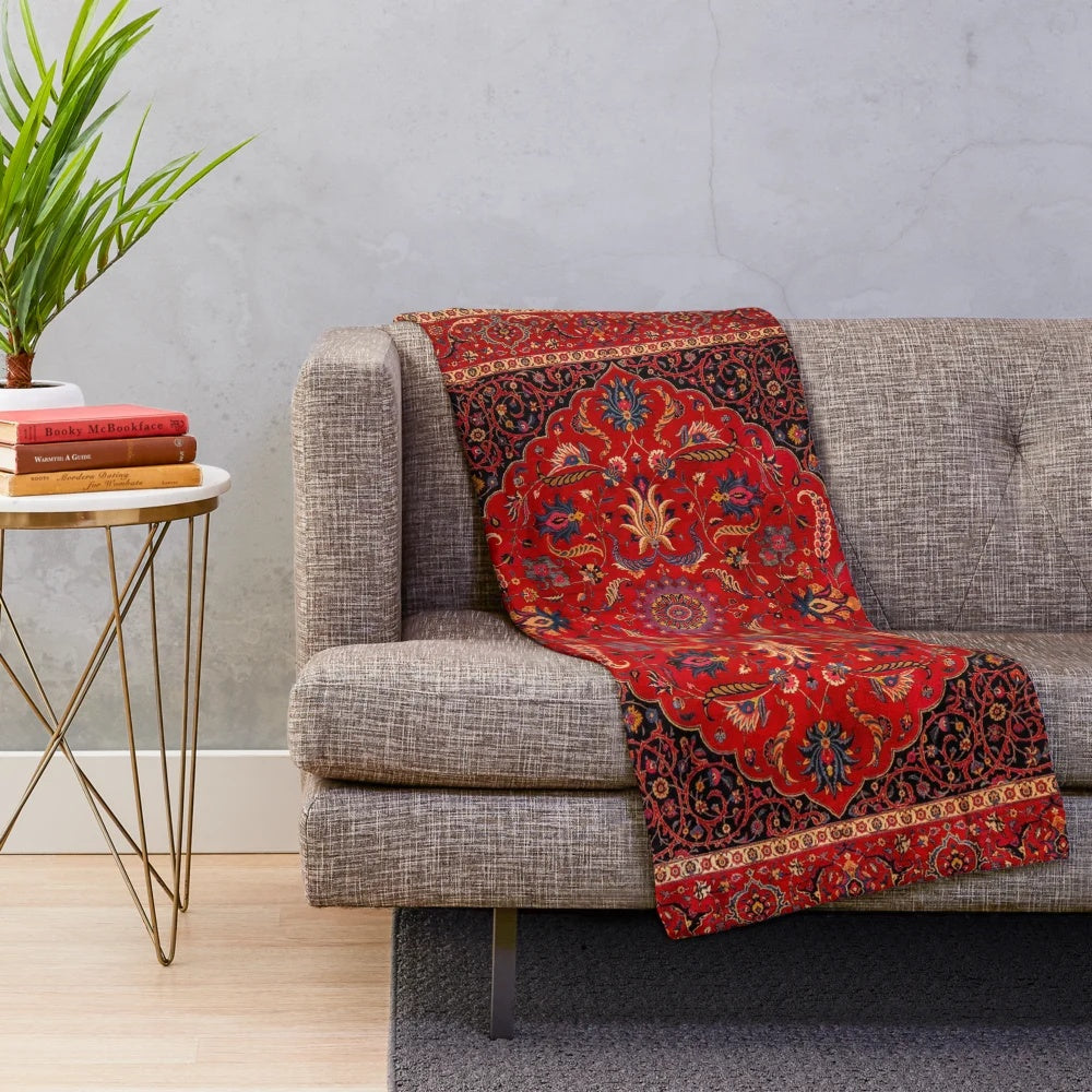 Red Persian-inspired plush blanket with antique rug design