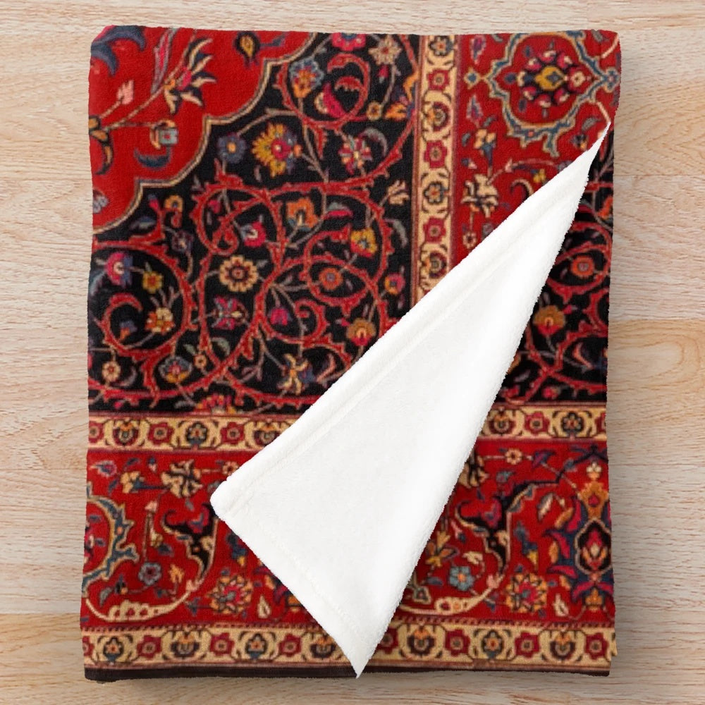 Red Persian-inspired plush blanket with antique rug design