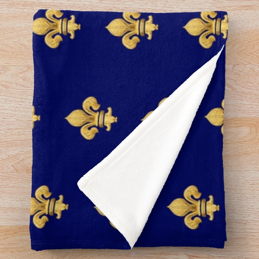 Soft, plush blue floral blanket with royal fleur de lys design