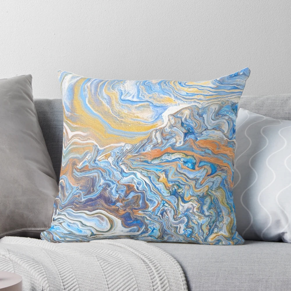 Elegant sea cliffs-patterned pillow with shimmering gold and bronze accents, perfect for beach-inspired home decor