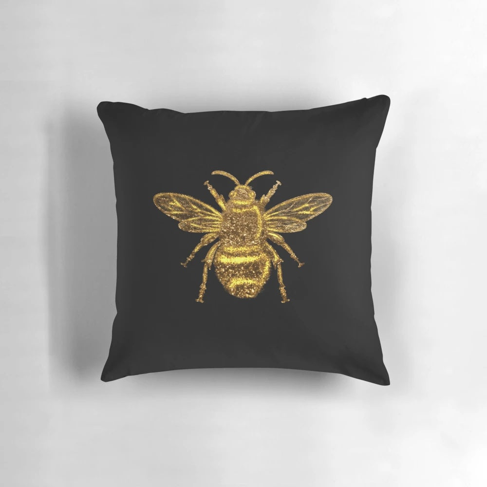 Glamorous gold and glitter queen bee decorative pillow with a stylish, modern design.