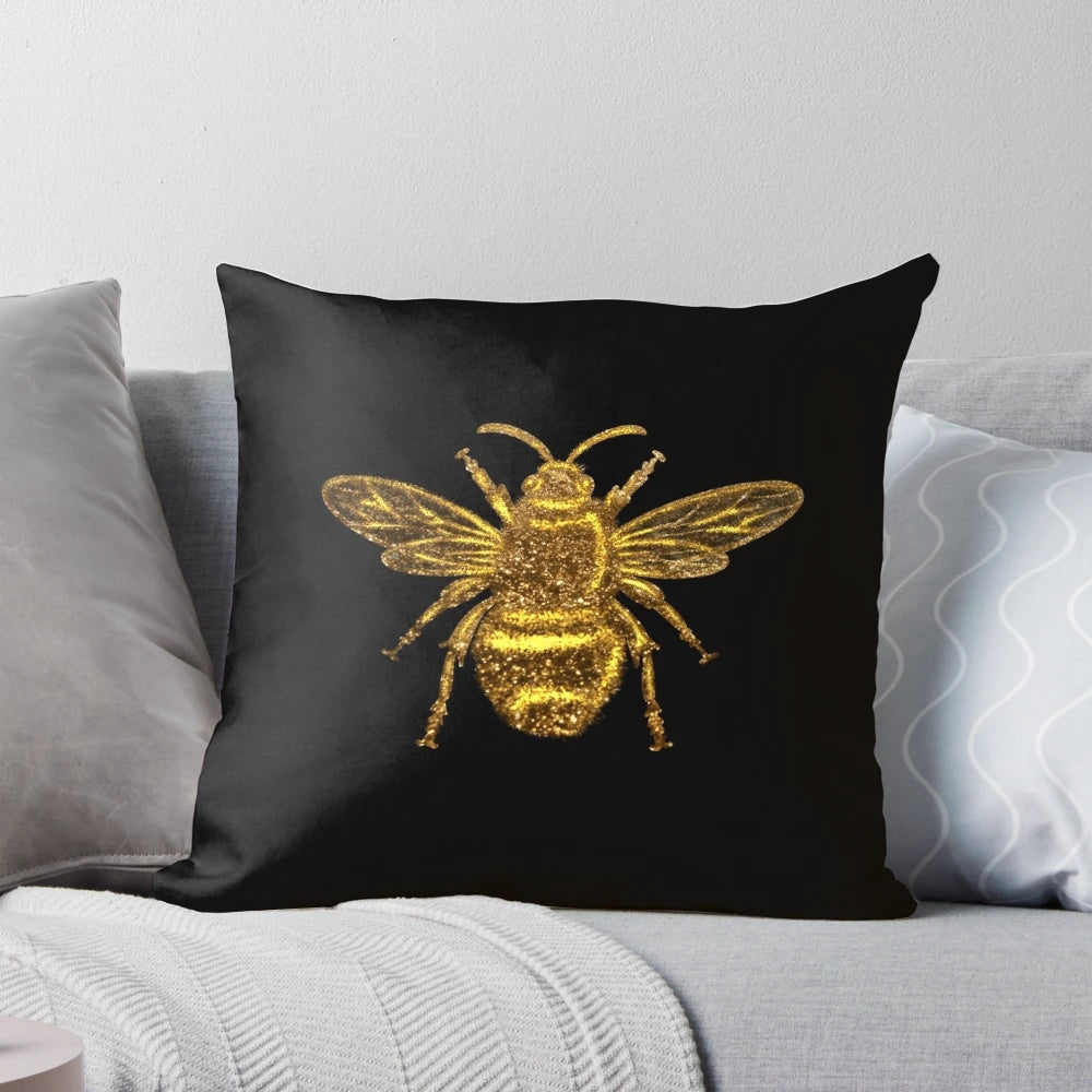 Glamorous gold and glitter queen bee decorative pillow with a stylish, modern design.