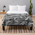 Cozy and soft plush blanket with a stylish designer pattern