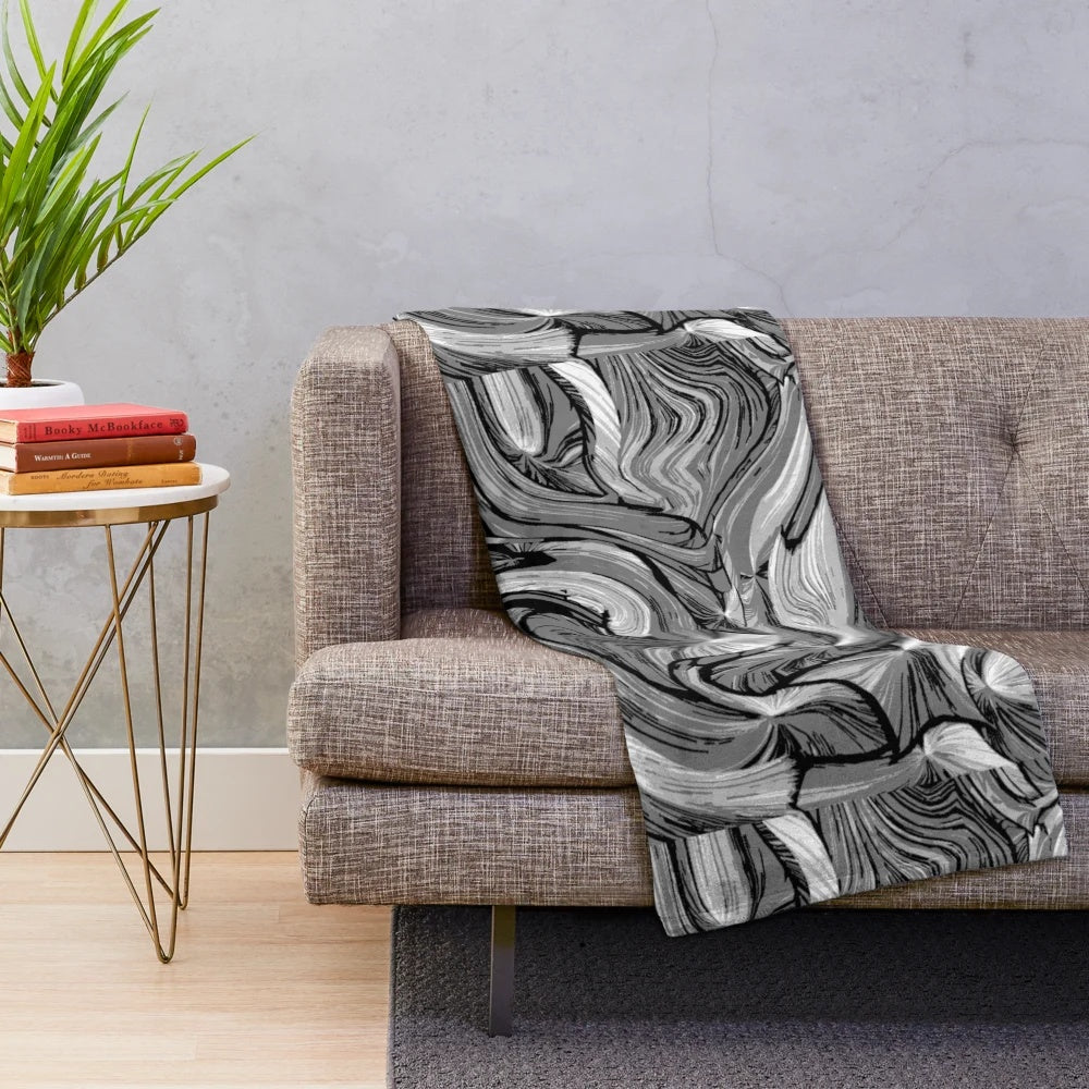 Cozy and soft plush blanket with a stylish designer pattern