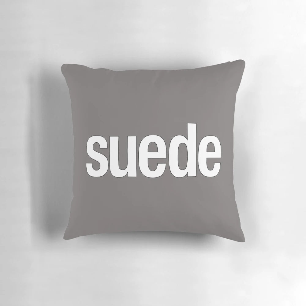 Soft, plush suede pillow with a modern and chic design, perfect for adding a touch of British style to your home.