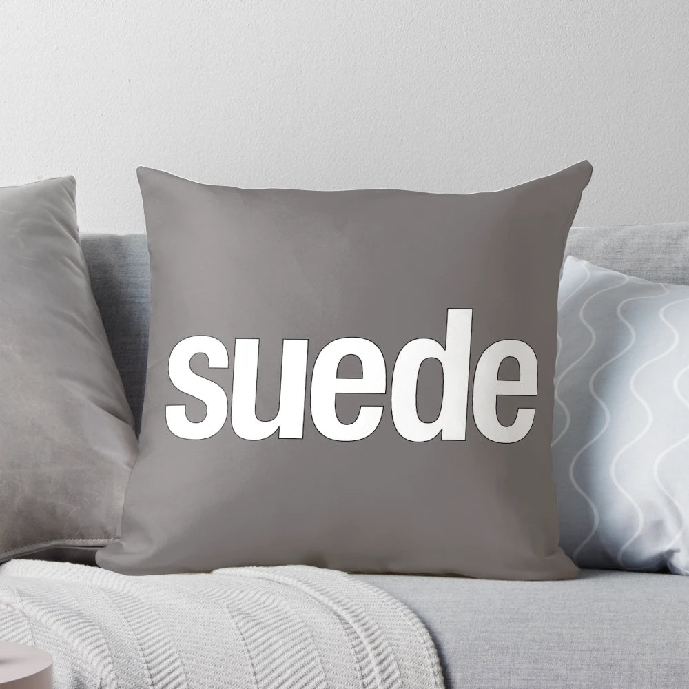 Soft, plush suede pillow with a modern and chic design, perfect for adding a touch of British style to your home.