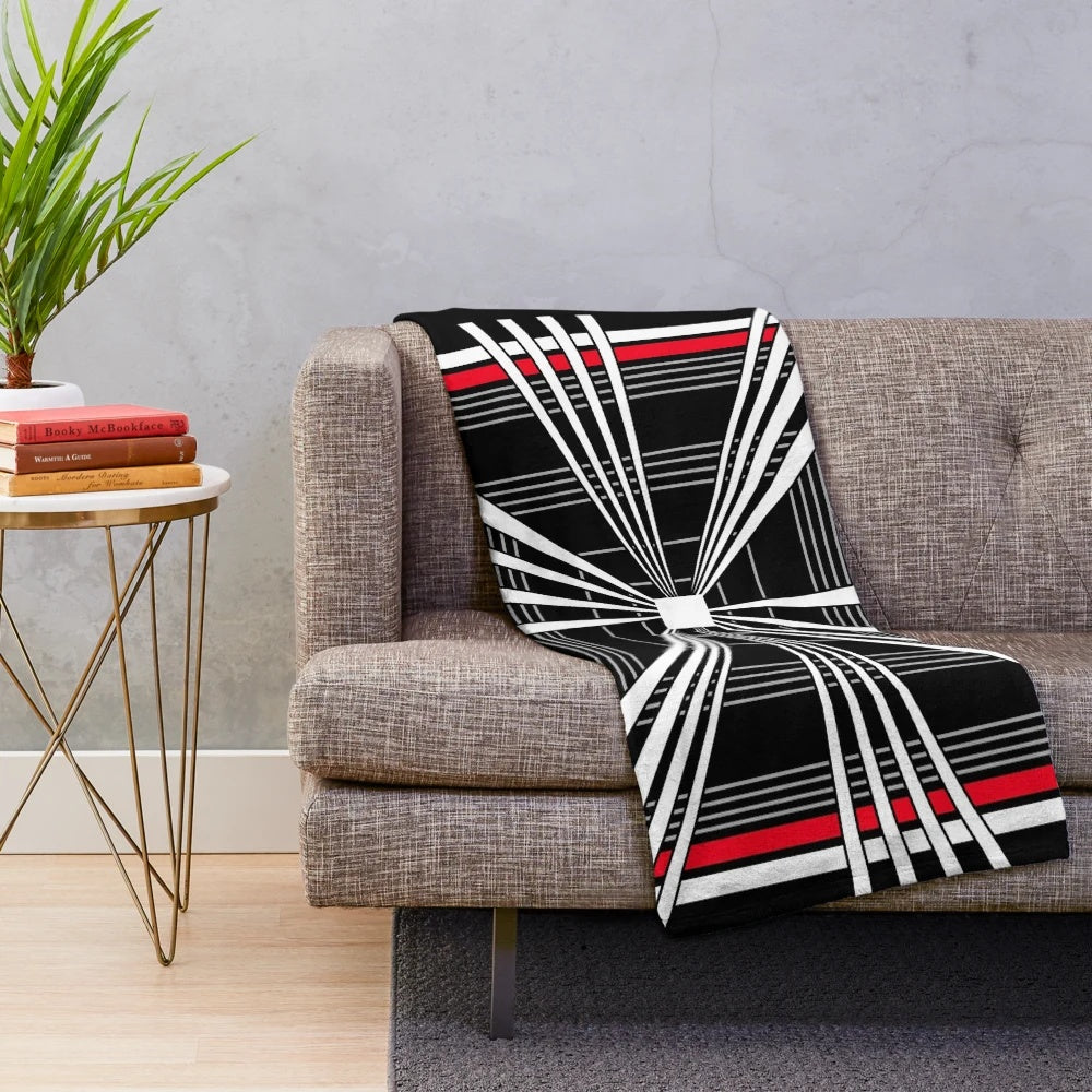 Tesla-inspired plush blanket with Plaid Mode design