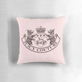 Pink and white y2k-inspired juicy couture crown pillow with velour texture