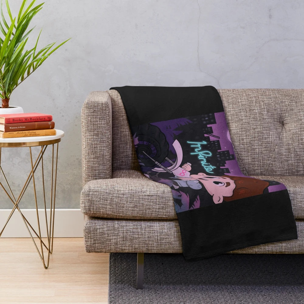 Caylus plush blanket in a cozy living room setting