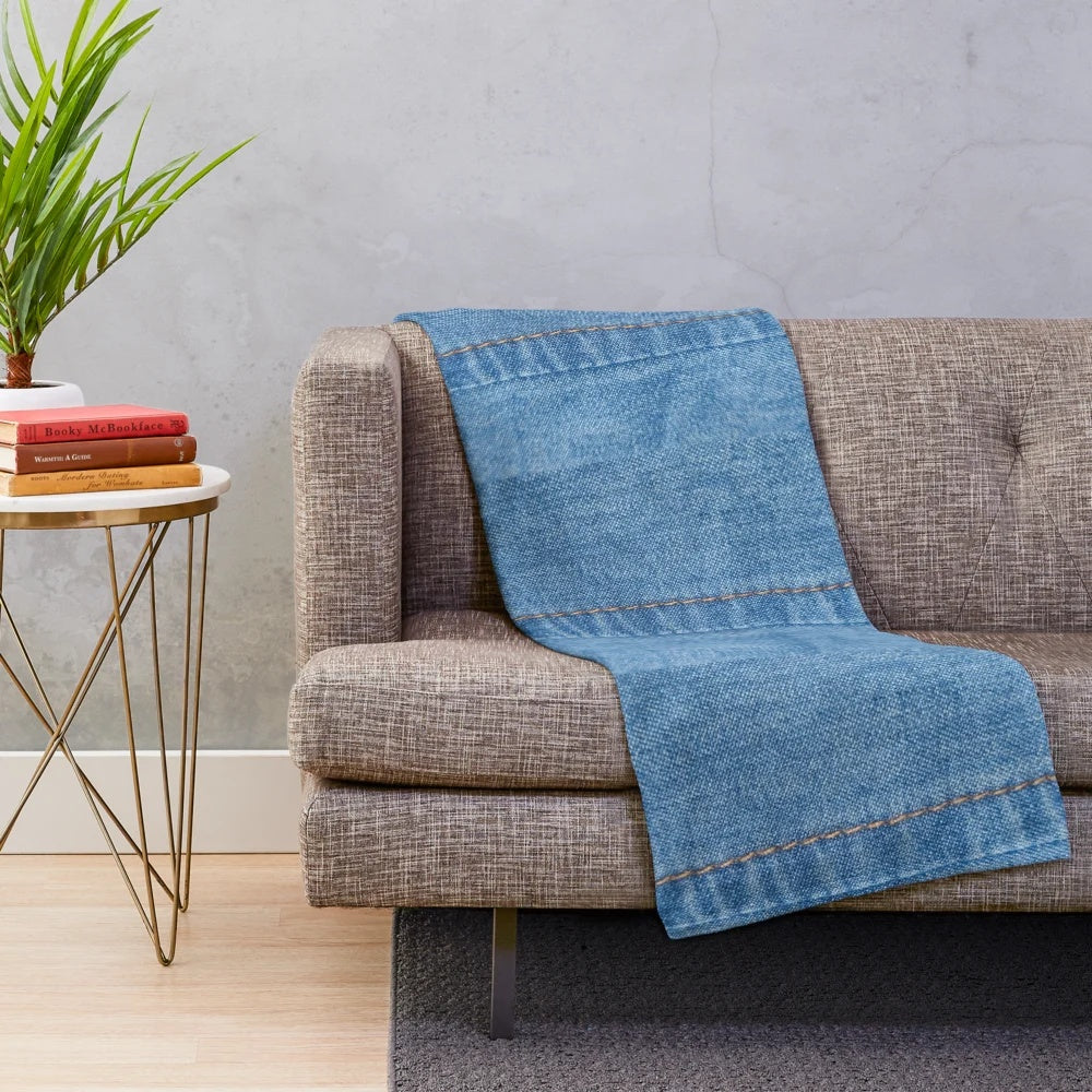 Denim plush blanket providing cozy comfort