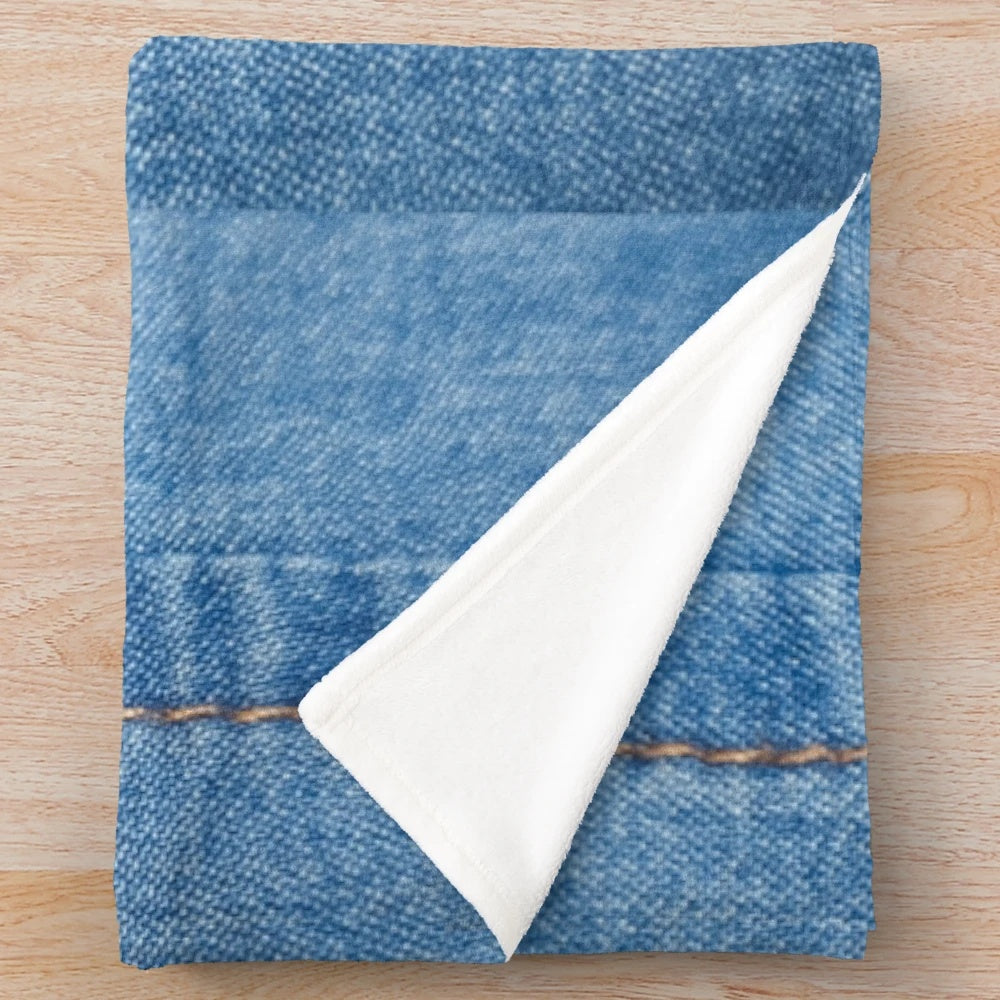 Denim plush blanket providing cozy comfort