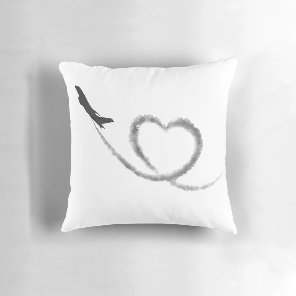 Sleek black and white airplane-shaped travel pillow