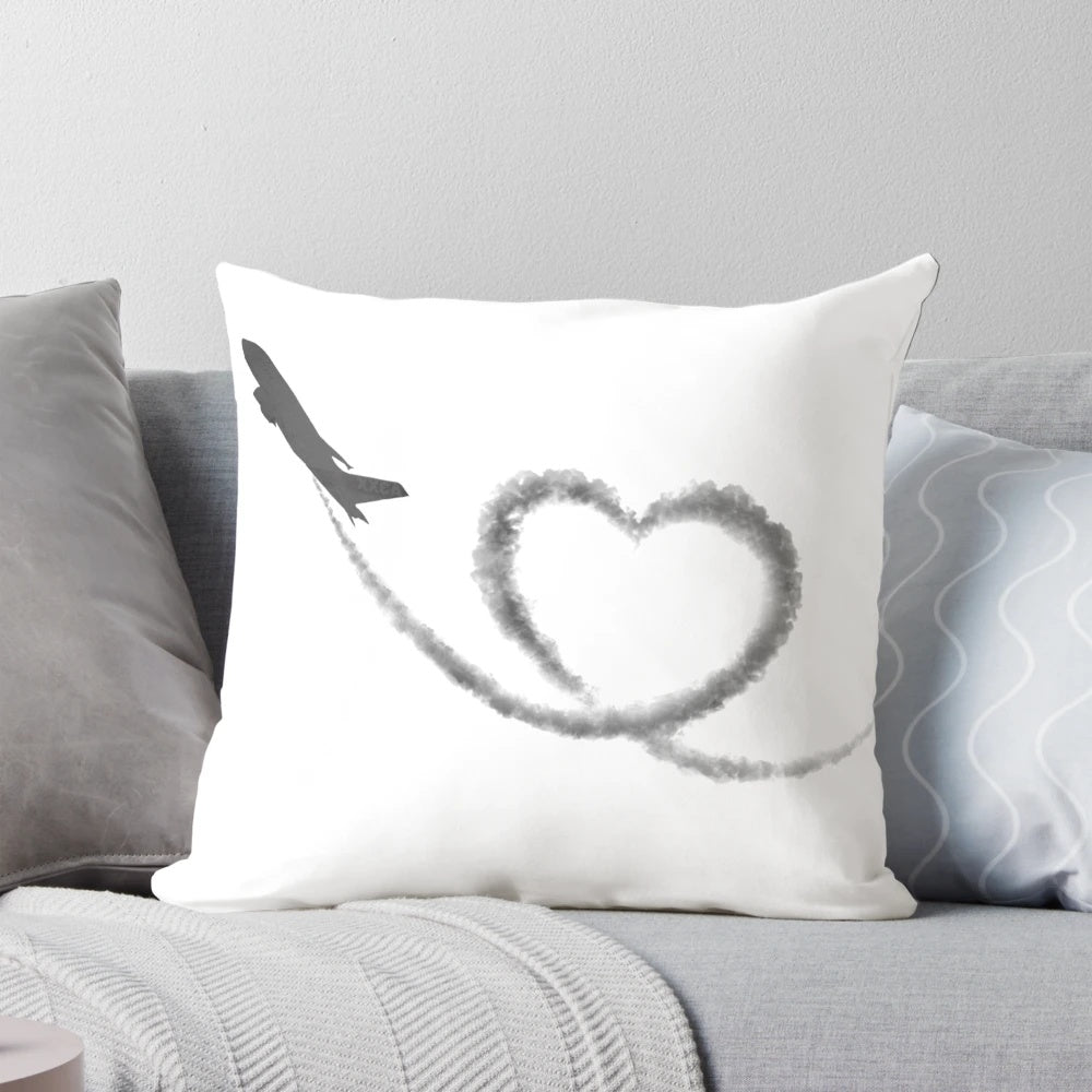 Sleek black and white airplane-shaped travel pillow