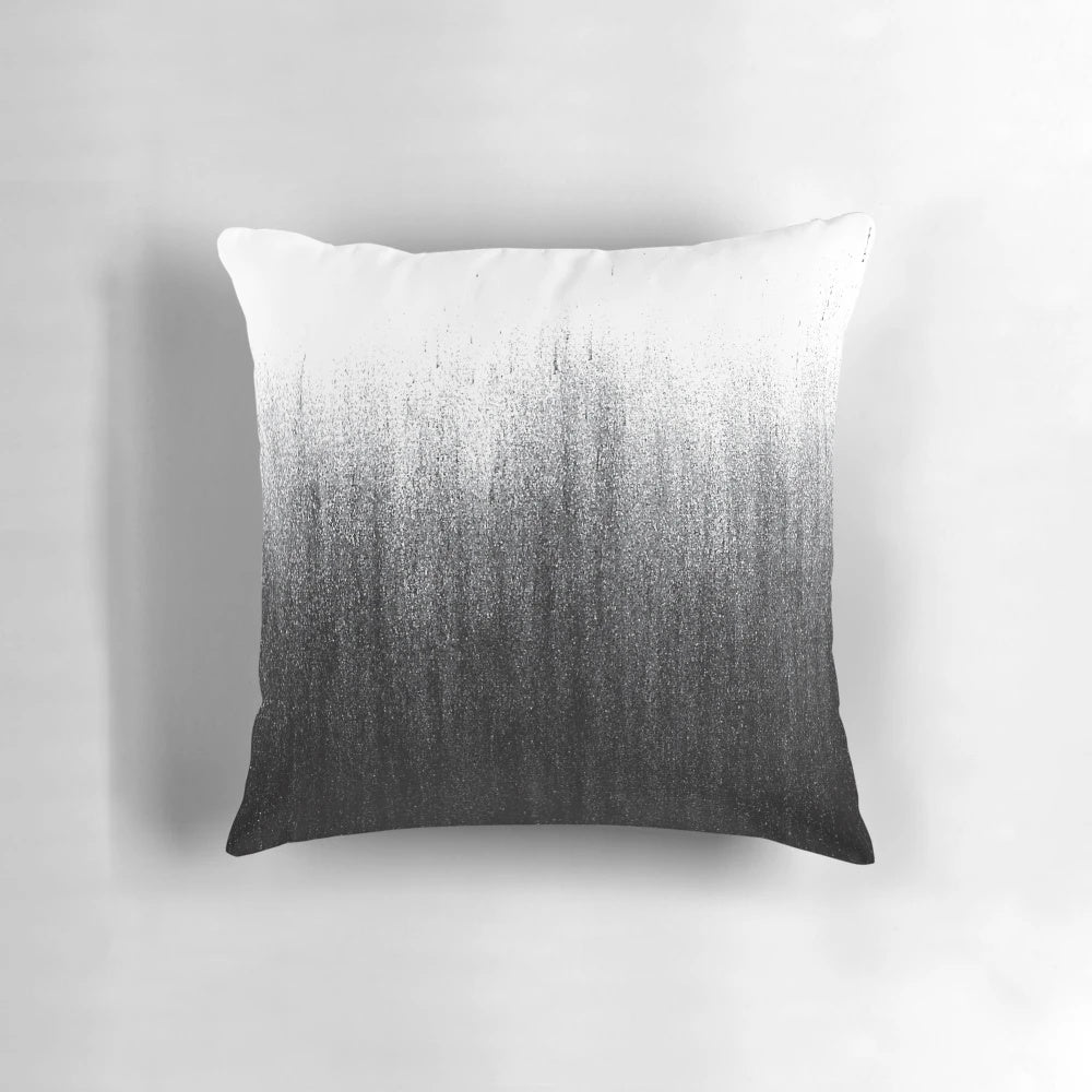 Charcoal ombré patterned pillow with a modern, abstract design