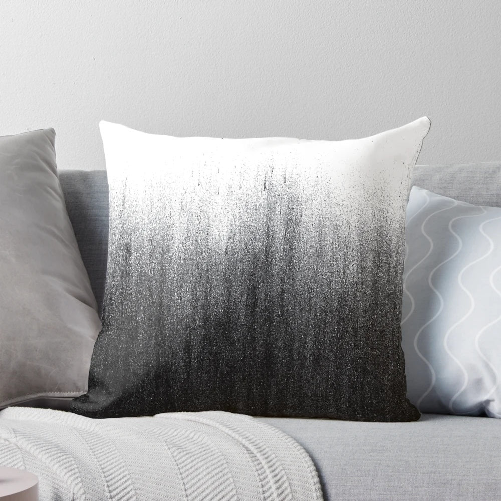 Charcoal ombré patterned pillow with a modern, abstract design