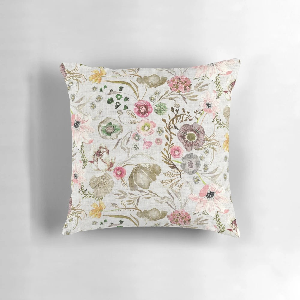 Closeup of a luxurious floral pillow with a nature-inspired pattern in neutral colors