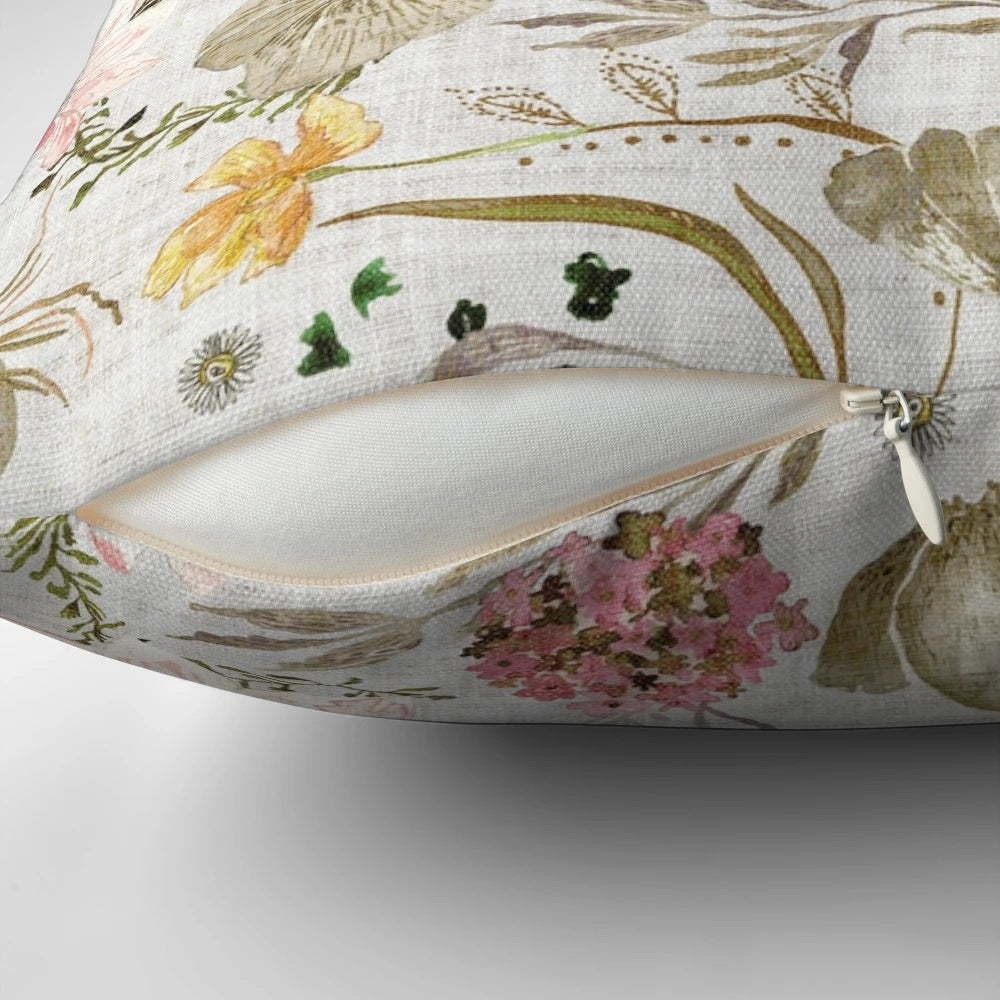Closeup of a luxurious floral pillow with a nature-inspired pattern in neutral colors