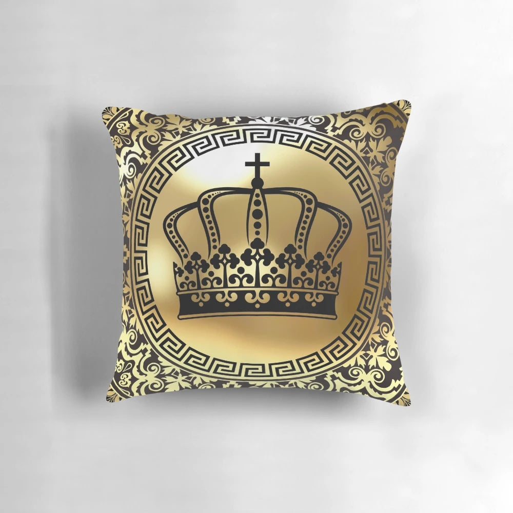 Ornate baroque-style black and gold throw pillow with Greek key pattern design