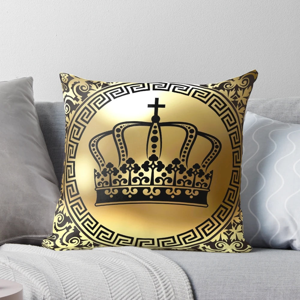 Ornate baroque-style black and gold throw pillow with Greek key pattern design