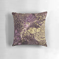 Luxury pillow featuring abstract design of purple and gold leaves