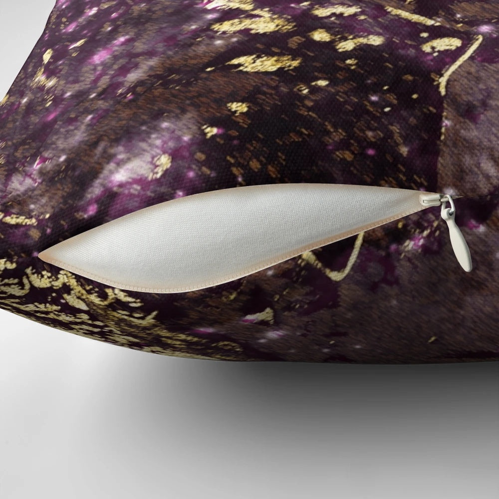 Luxury pillow featuring abstract design of purple and gold leaves
