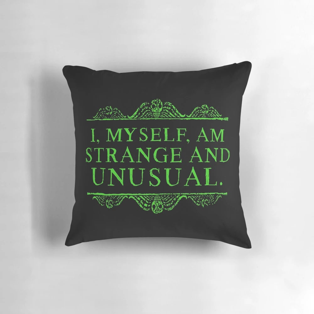 Black and green "I, Myself, Am Strange and Unusual" Lydia Deetz themed pillow