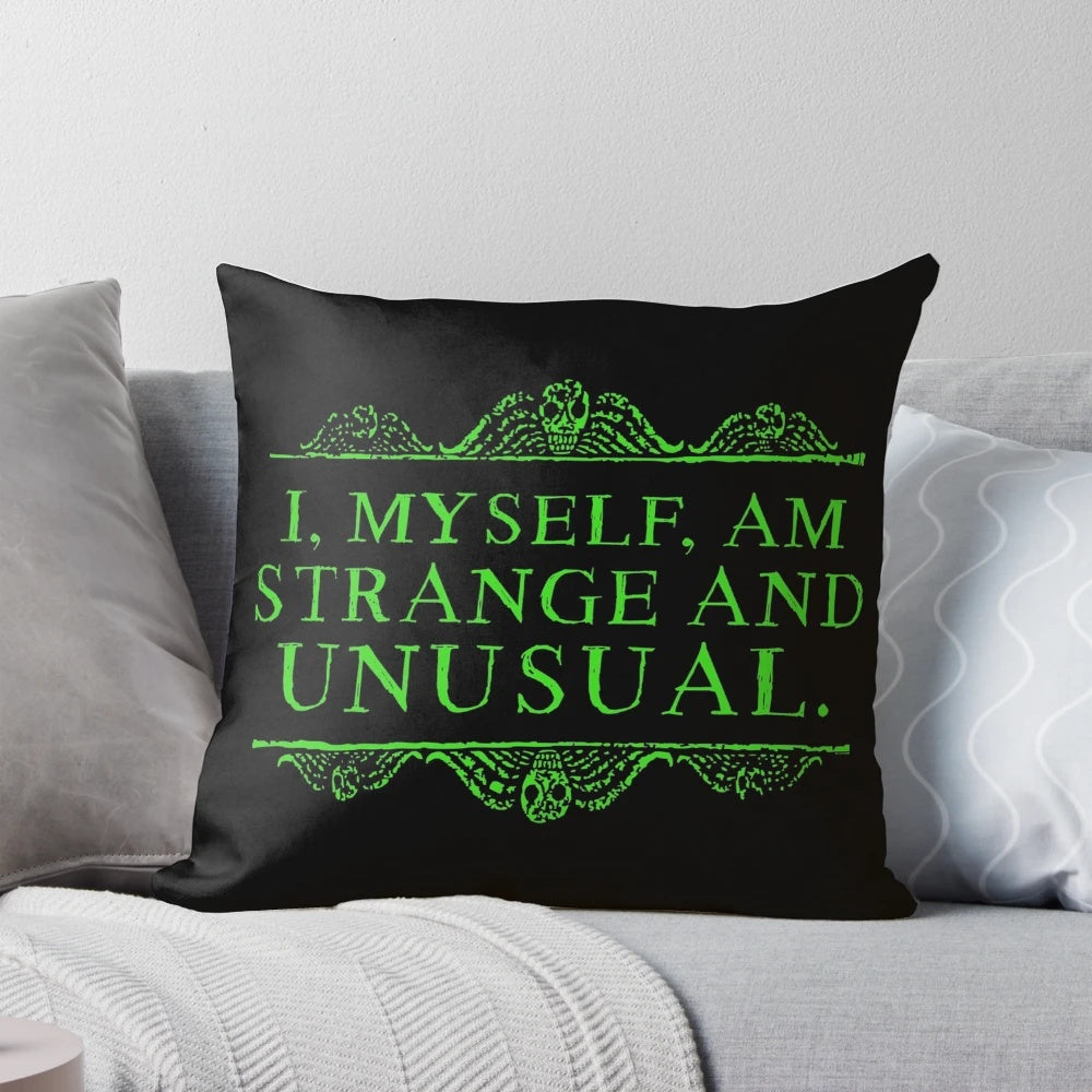 Black and green "I, Myself, Am Strange and Unusual" Lydia Deetz themed pillow
