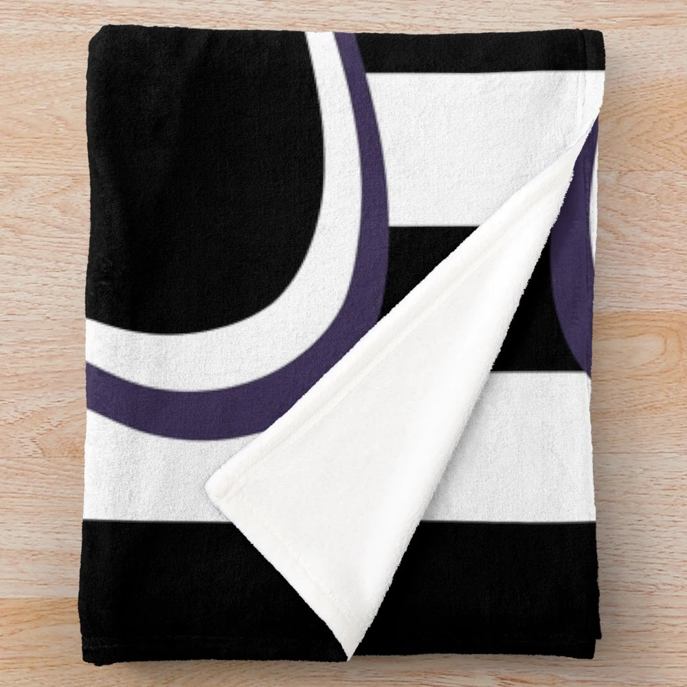 Black and white striped plush blanket with a gothic, creepy aesthetic