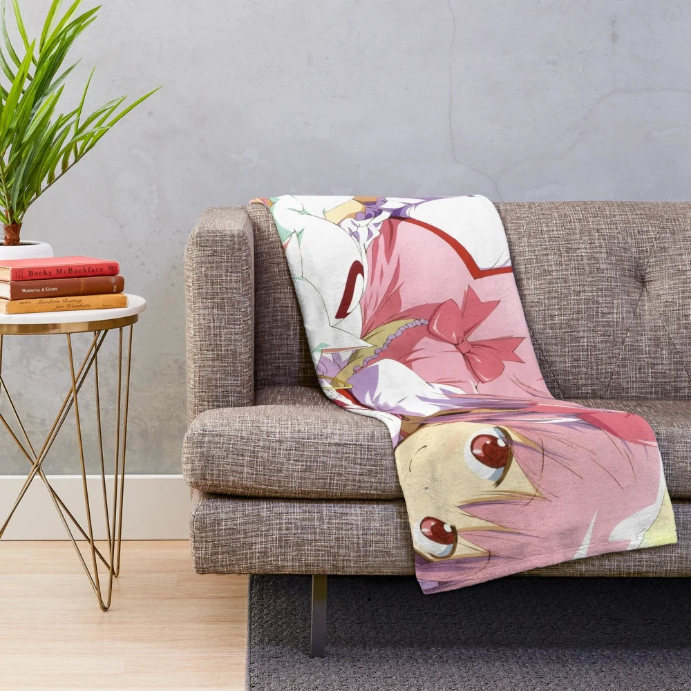Madoka Magica inspired plush blanket featuring characters from the popular anime series