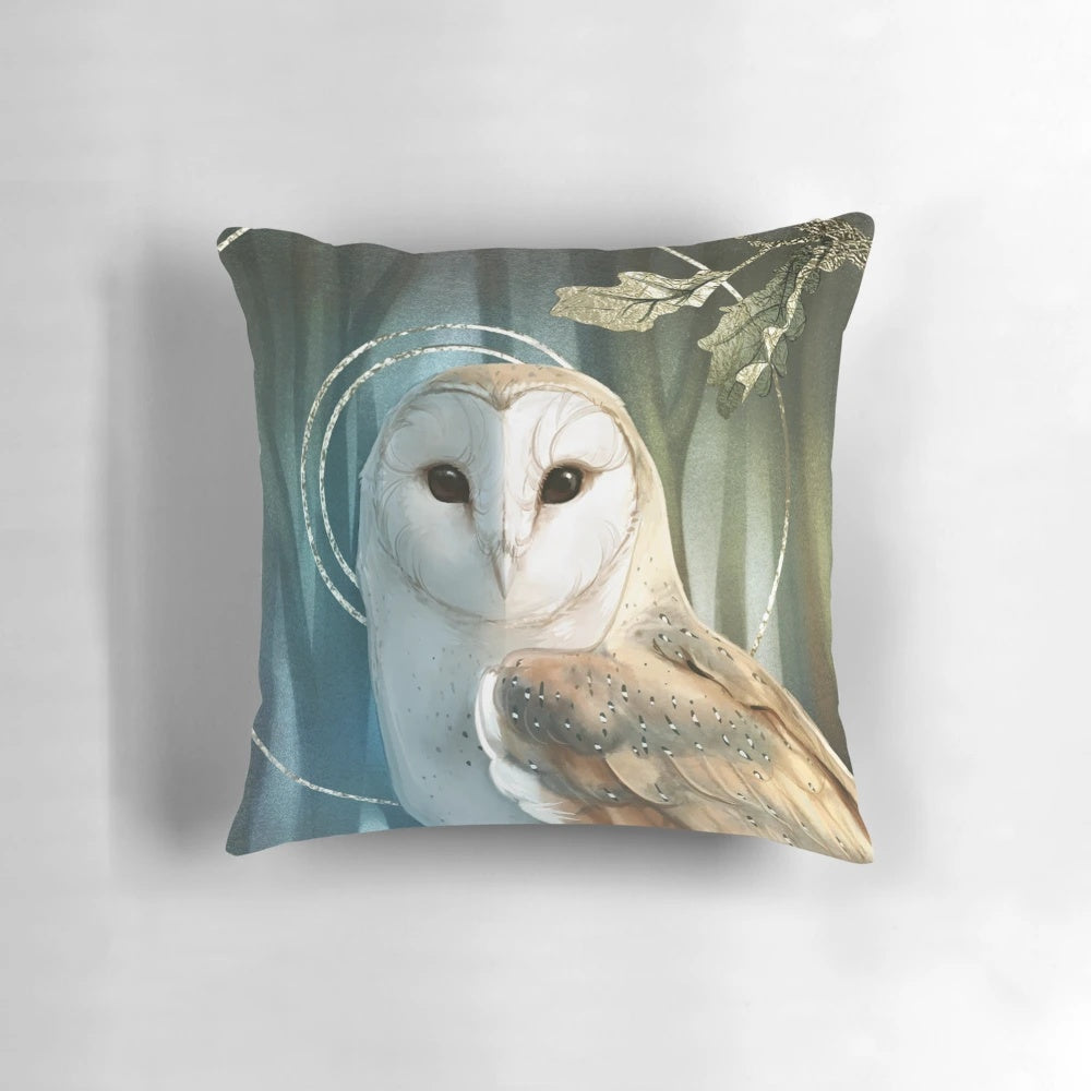 A cozy and mystical December owl throw pillow with silver, oak, and Celtic-inspired design elements.
