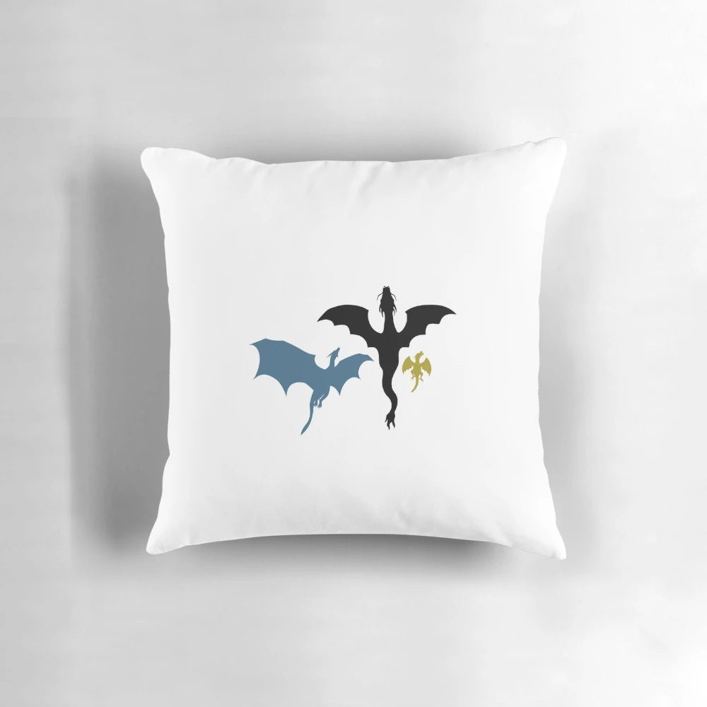 A cozy throw pillow featuring stickers of the fourth wing dragons Tairn, Sgaeyl, and Andarna from a beloved fantasy series.