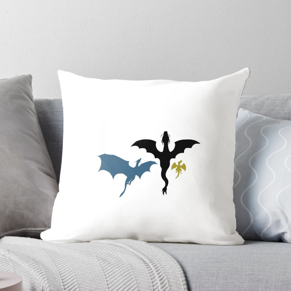 A cozy throw pillow featuring stickers of the fourth wing dragons Tairn, Sgaeyl, and Andarna from a beloved fantasy series.