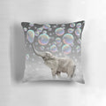 A whimsical, surreal pillow featuring an elephant in a cloud of colorful bubbles, creating a dreamlike, magical aesthetic.