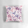 A decorative throw pillow featuring a whimsical, fire-breathing dragon in shades of pink and purple watercolor.