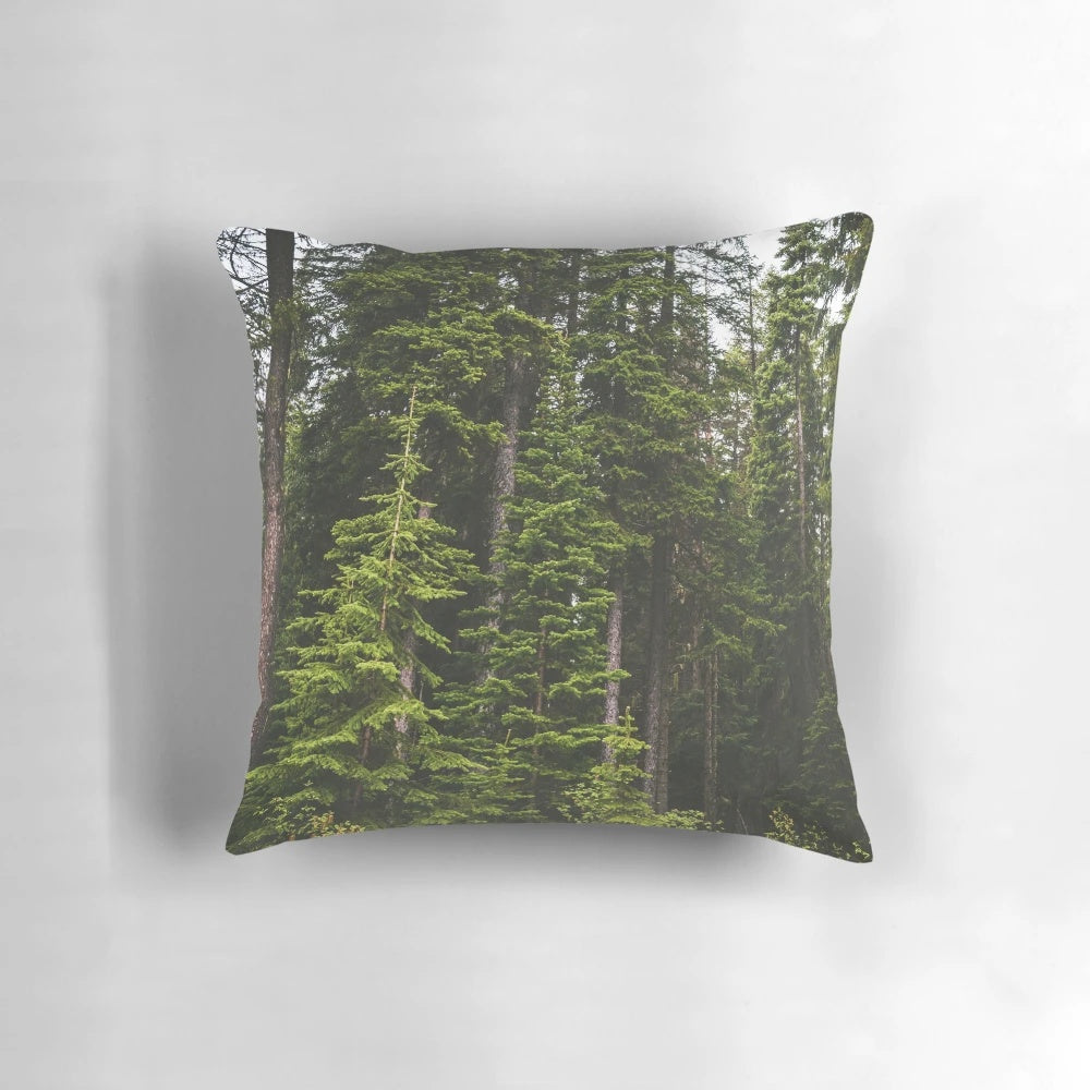 Cozy pillow featuring a serene forest landscape, perfect for camping and hiking