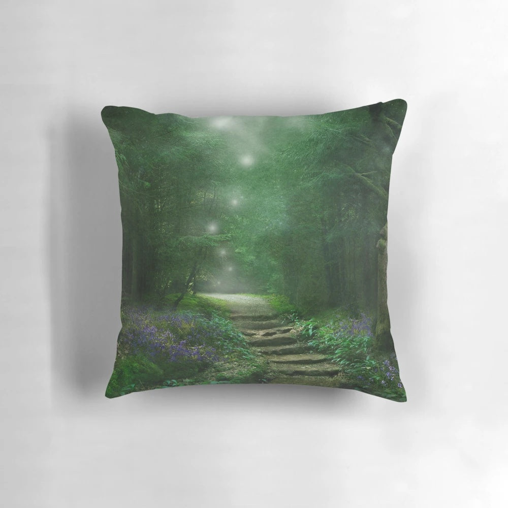 Decorative throw pillow with a magical forest and woodland scene, featuring whimsical elements and a mystical spirit.