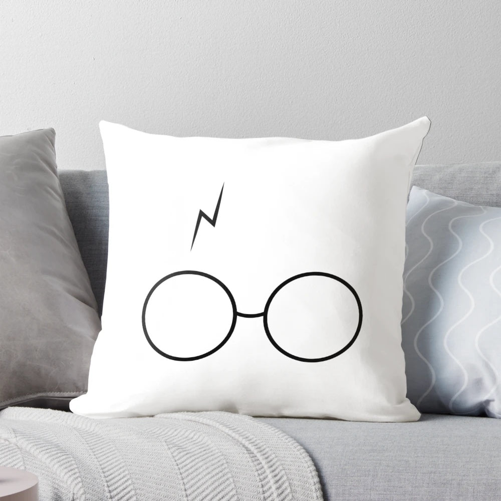 Pillow with a magical Harry Potter-inspired design featuring a silhouette of glasses and lightning
