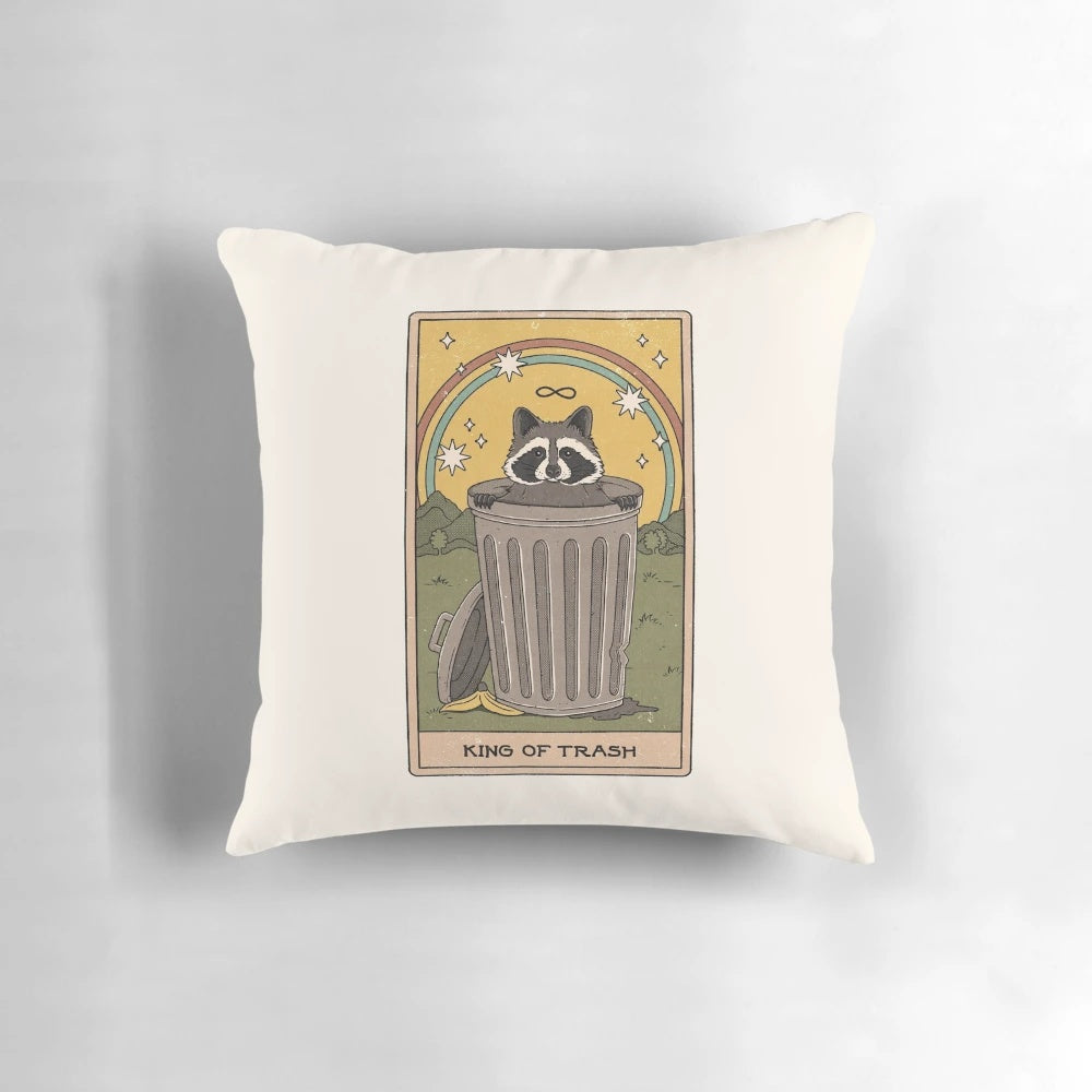 A plush and whimsical "King of Trash" pillow featuring a raccoon or possum design, perfect for adding a touch of mystical charm to any room.
