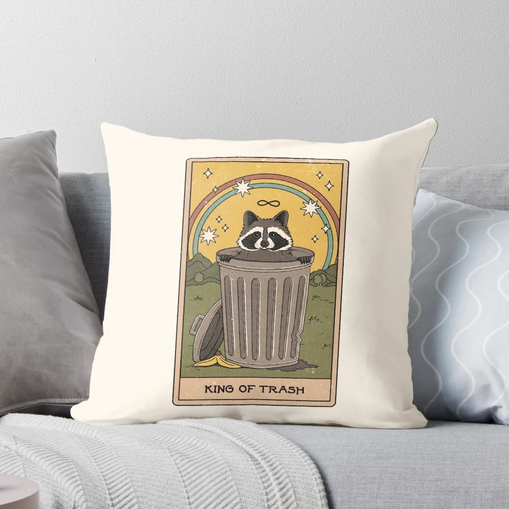 A plush and whimsical "King of Trash" pillow featuring a raccoon or possum design, perfect for adding a touch of mystical charm to any room.