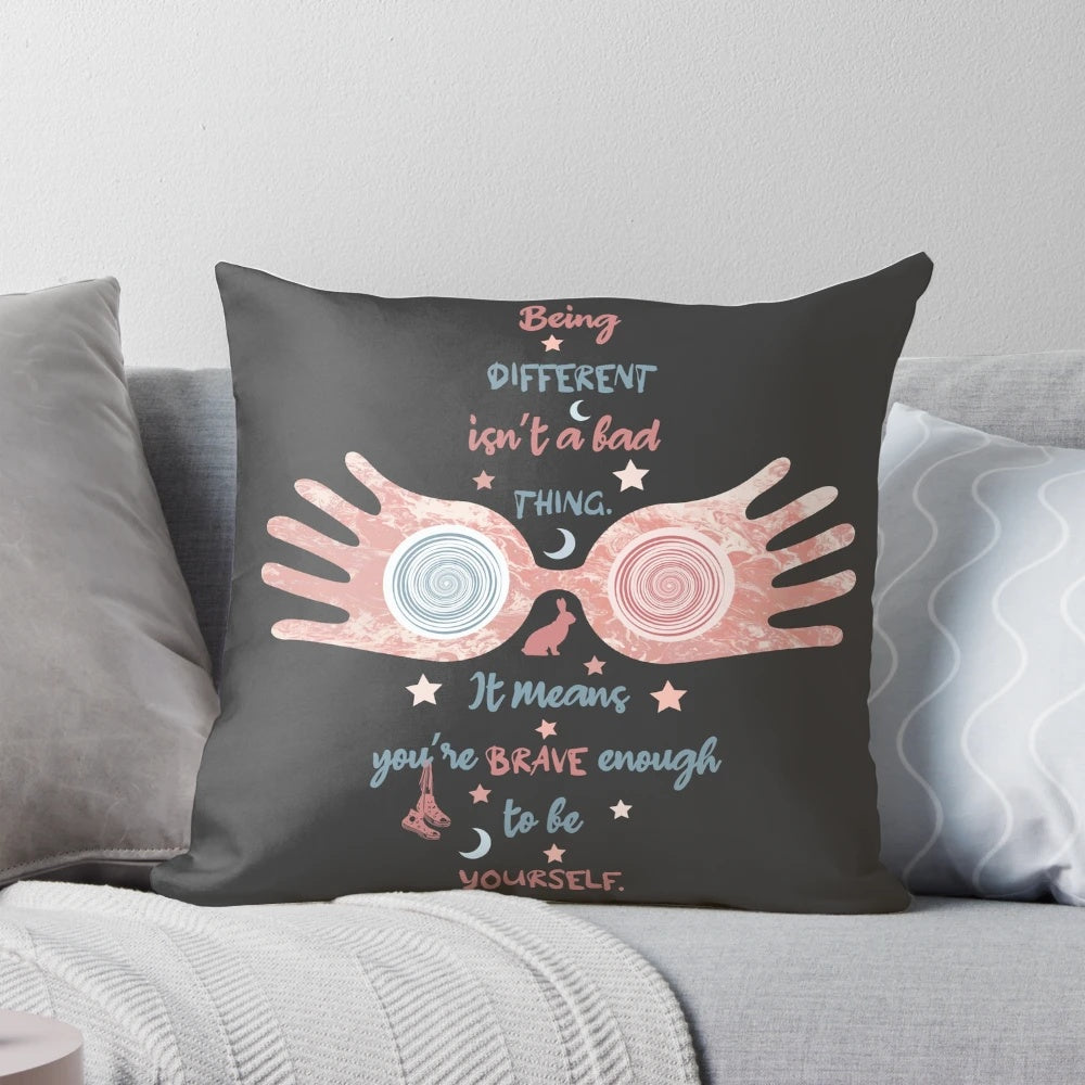 A plush, decorative pillow featuring the iconic wizard glasses of Luna Lovegood from the Harry Potter series.