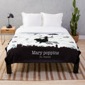 Mary Poppins inspired plush blanket with silhouette, book cover, and London skyline design