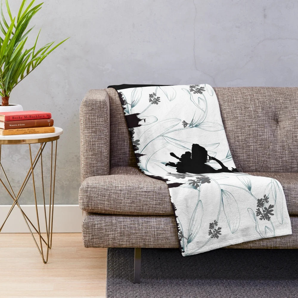 Mary Poppins inspired plush blanket with silhouette, book cover, and London skyline design